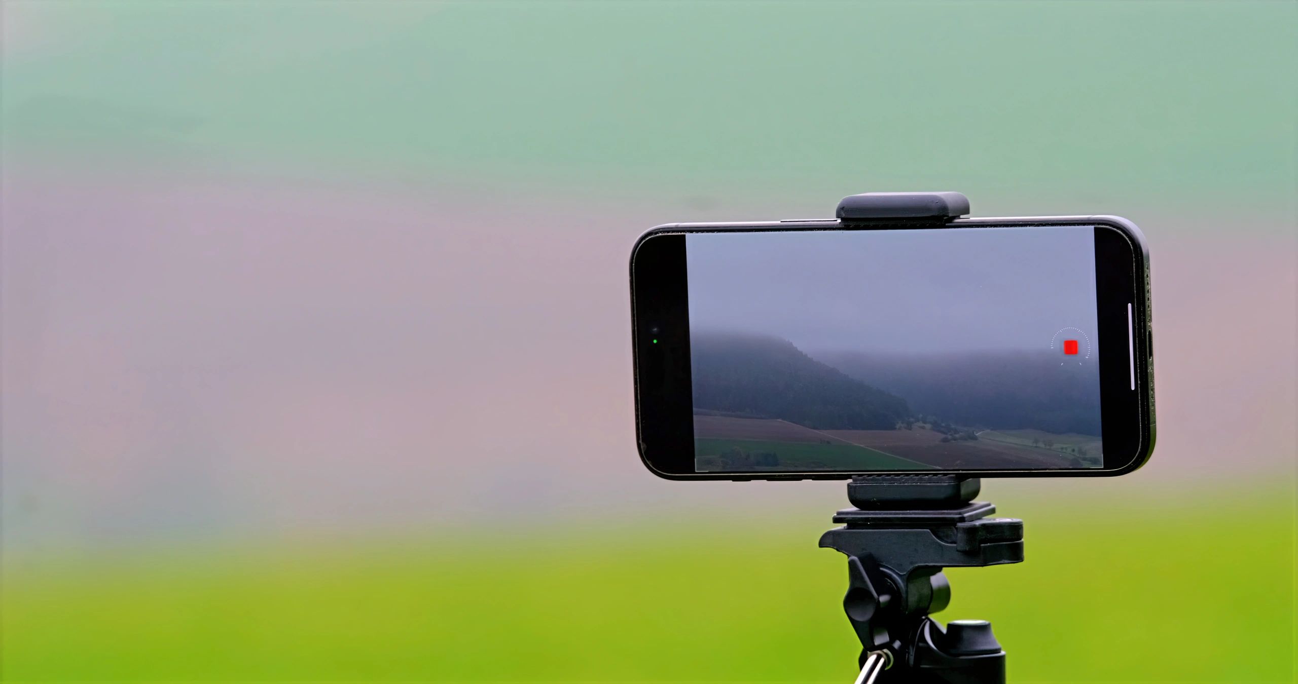 Camera on tripod representing a creator production setup