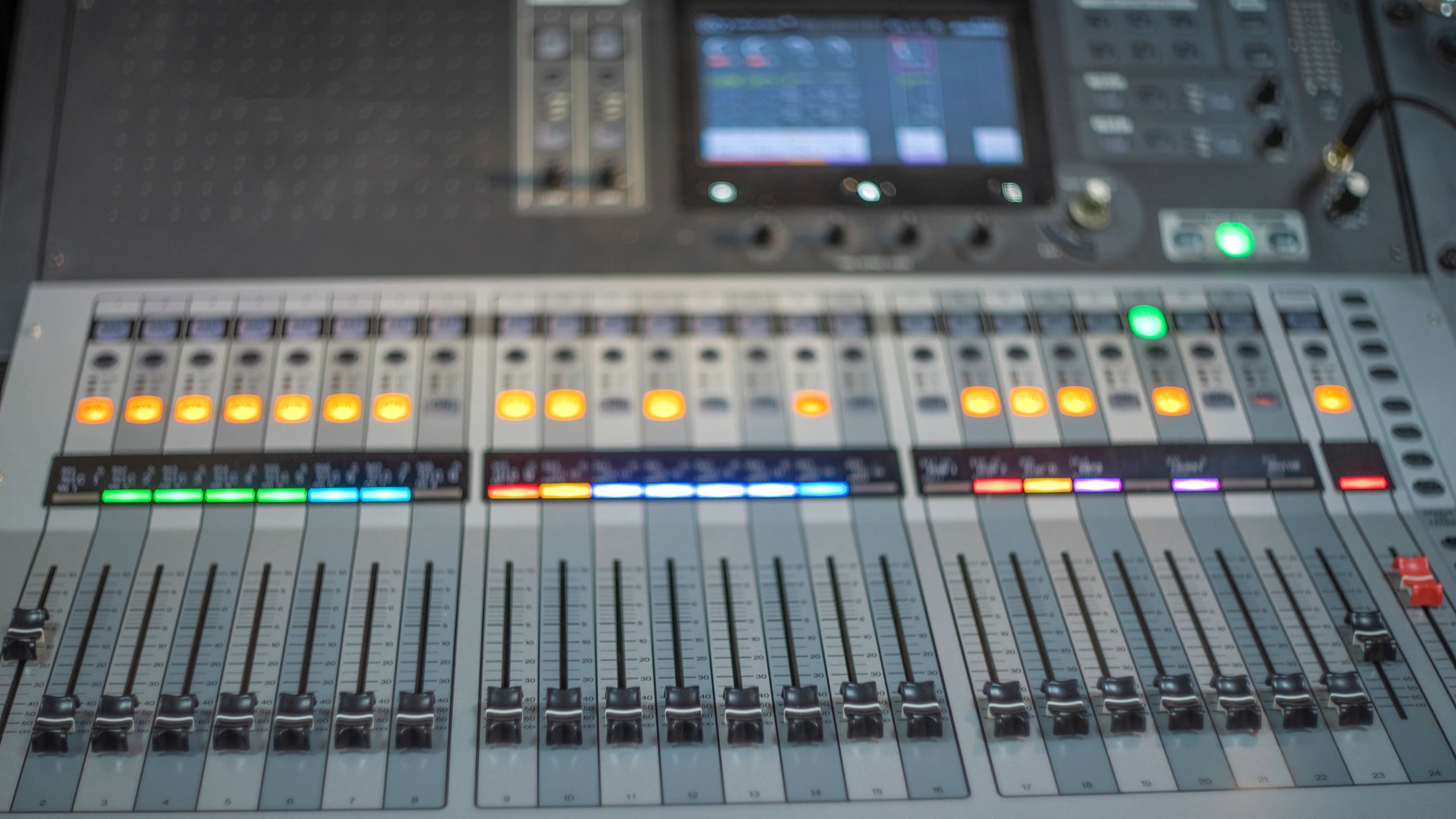 Professional audio mixing console in a studio environment